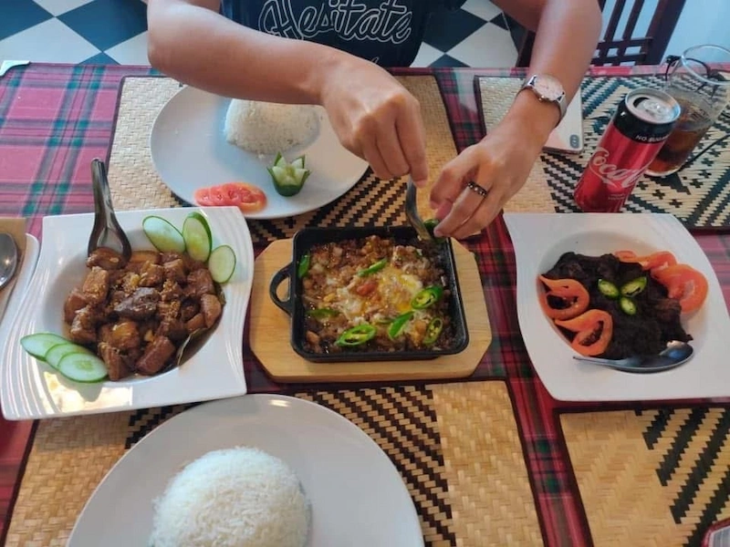 Crispy pata sisig and dinuguan