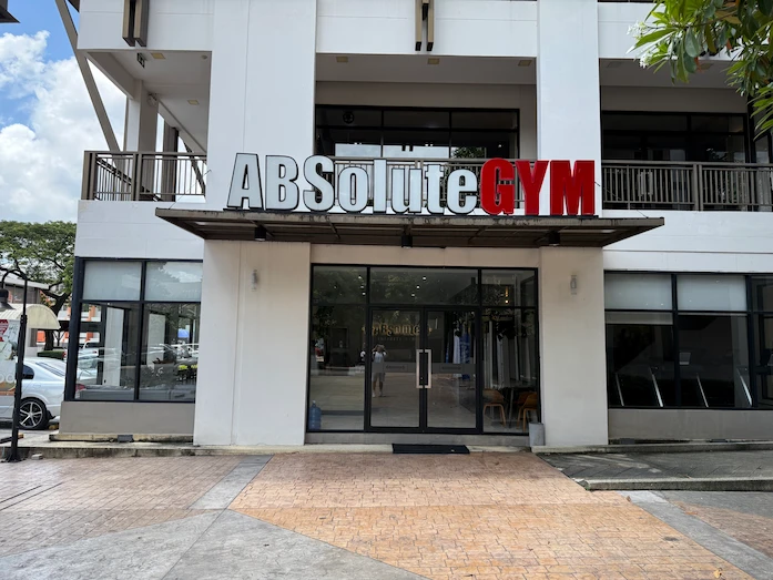 Picture taken in front of the ABSolute Gym in Chiang Mai, Thailand, showing the gym building and the entrance area.