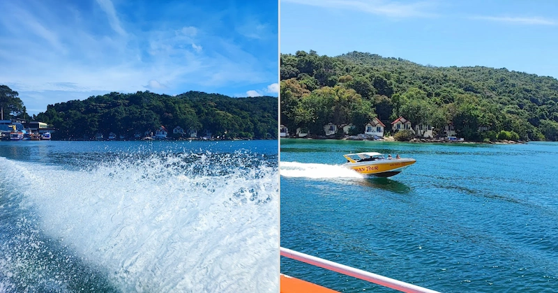 View from a ferry boat showing the green coastline of Koh Samet island under a blue sky.