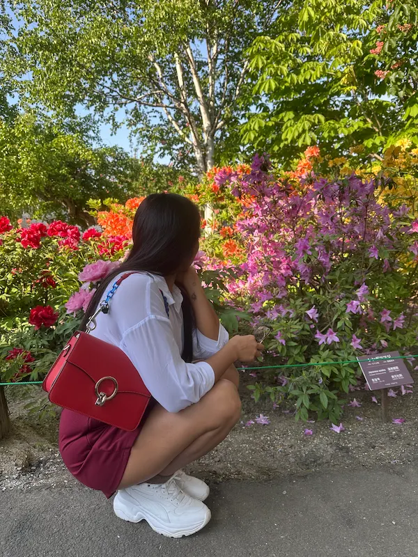 Admiring the colorful flowers in Farm Tomita