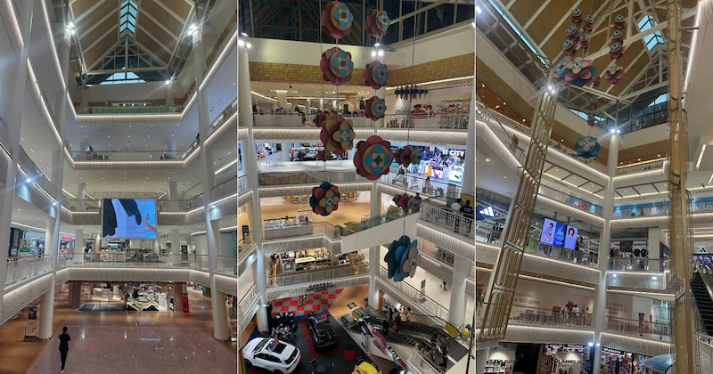 Photos taken inside the mall, different levels of the mall and some flower icons as decors hanged above their ceiling
